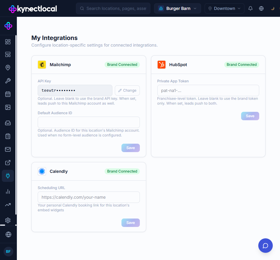 My Integrations page showing the Mailchimp card with Brand Connected badge, a masked API key hint (teewtr•••••••••), a Change button, and an optional Default Audience ID field.